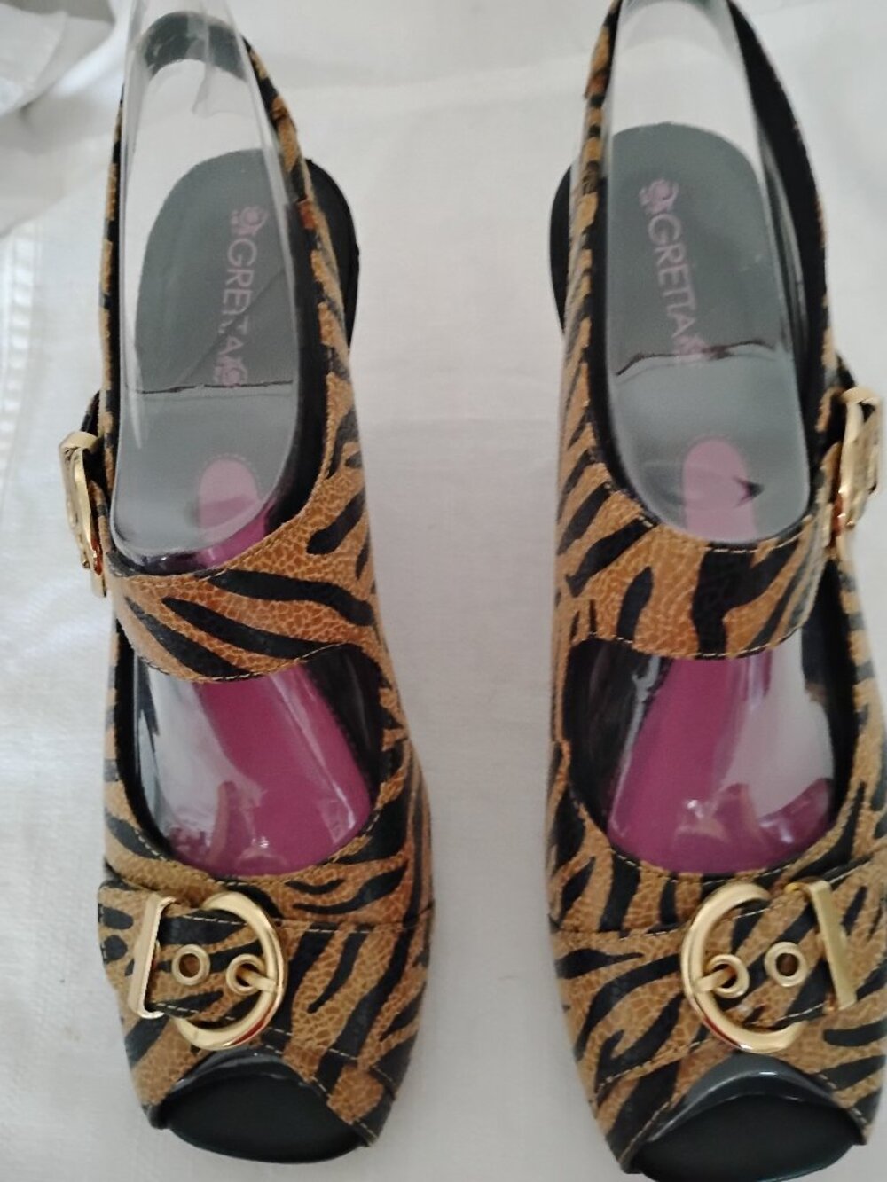 Gretta sz 8  open toe sling pumps.  Black and tan striped animal motif.
